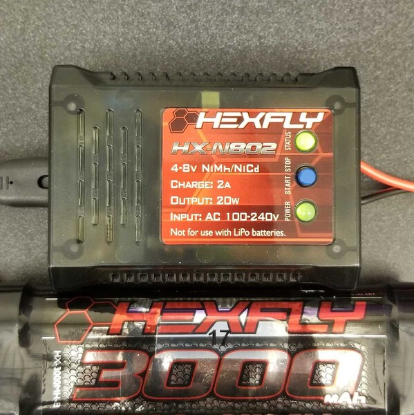Batteries in a charged state. A solid red light indicates charging; solid green light indicates full.